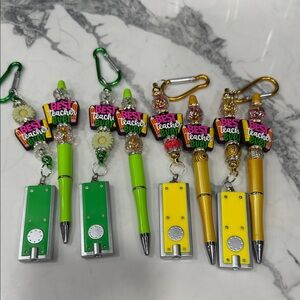 “Best Teacher Ever,” beaded keychain/pen sets. Show your teacher appreciation.